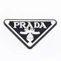 Prada triplate stylised badge logo white on black P2197a Shoe Charm