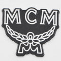 MCM Stylised shield white on black P2236 Shoe Charm