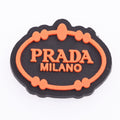 PRADA stylised shield orange P4143 Shoe Charm