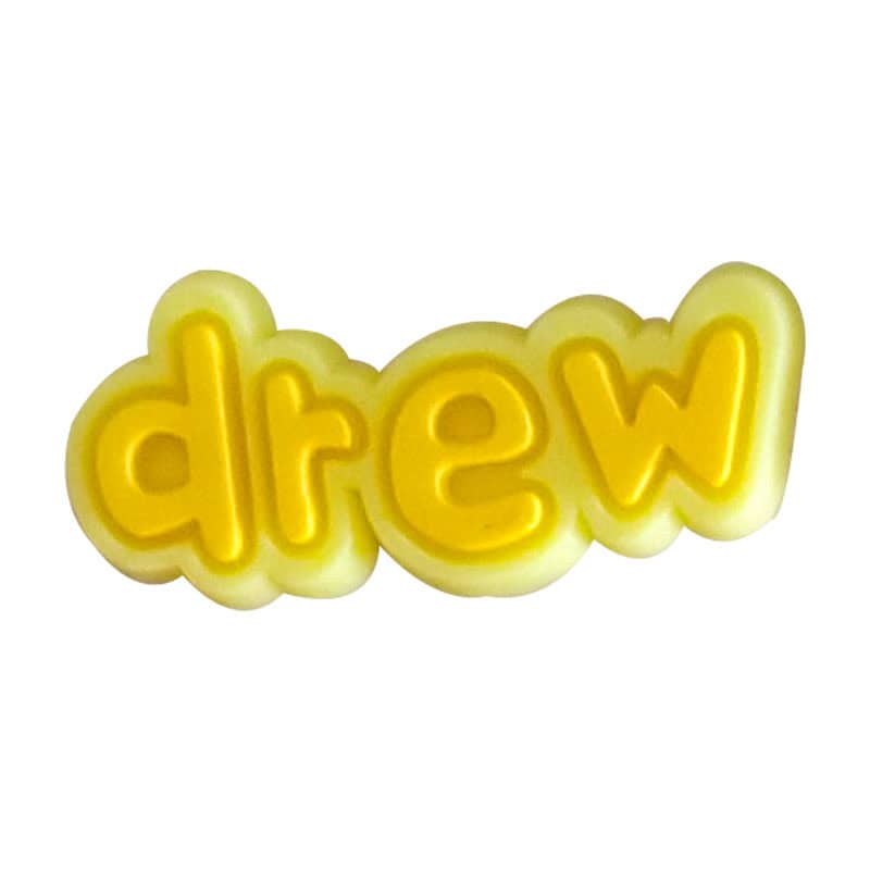 Yellow sign Drew house 107-01 Shoe Charm